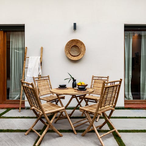 Sit down to a celebratory alfresco meal on the terrace