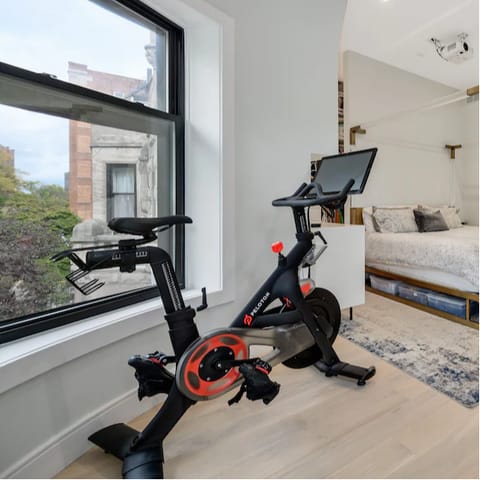 Start the morning off with an energising workout on the Peloton bike