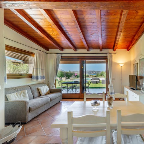 Relax in the beamed living area when the Sardinian sun gets too hot