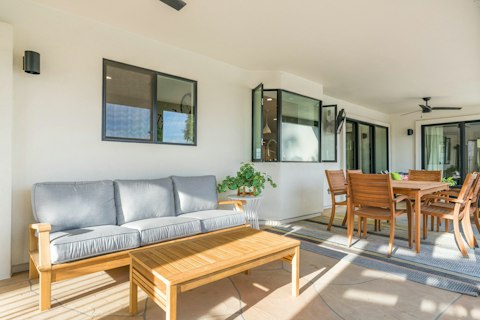 Relax on the covered terrace before setting the table for dinner