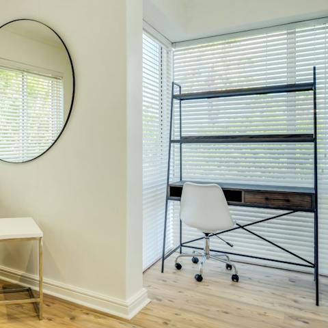 Get some work done at the desk in the window