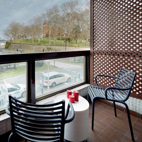 Sit on the terrace with a glass of wine