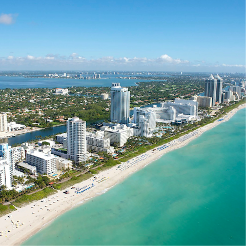 Pack a beach bag and head to the golden shores of Miami