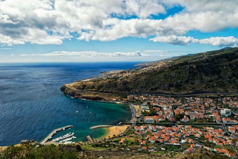 Stretch out on one of Madeira's rare golden sandy beaches, just a short walk away