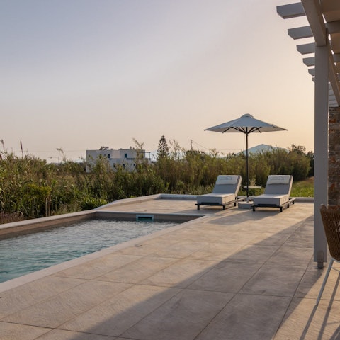 Take a dip in the private pool with stunning mountain views