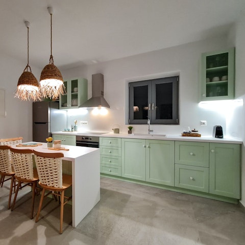 Prepare meals or snacks in the convenient kitchen