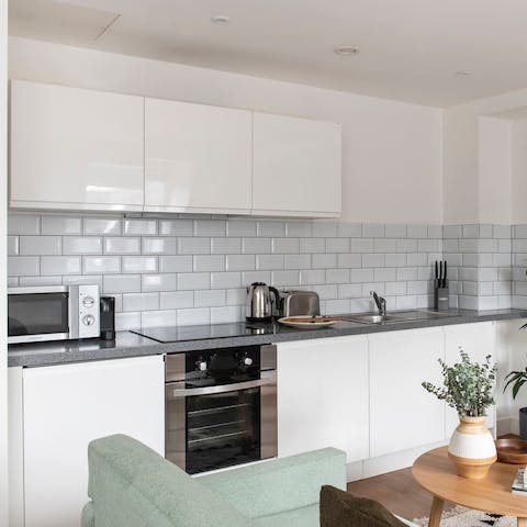 Work culinary magic in the pristine white kitchen