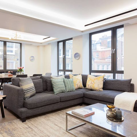 Relax on the living area’s large L-shaped sofa