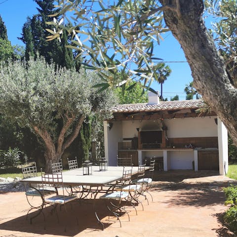 Cook rustic Mediterranean dinners in the outdoor kitchen