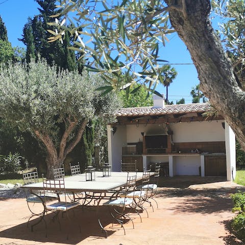 Cook rustic Mediterranean dinners in the outdoor kitchen