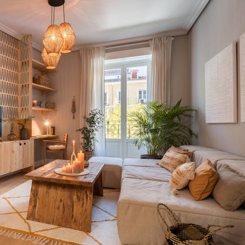 Open the doors to the balcony and listen to the sounds of Spain's capital