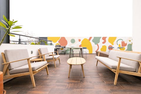 Have a relaxing coffee on the communal roof deck