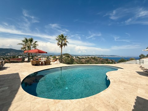 Plunge into cool water with the Bay of Cannes shimmering below
