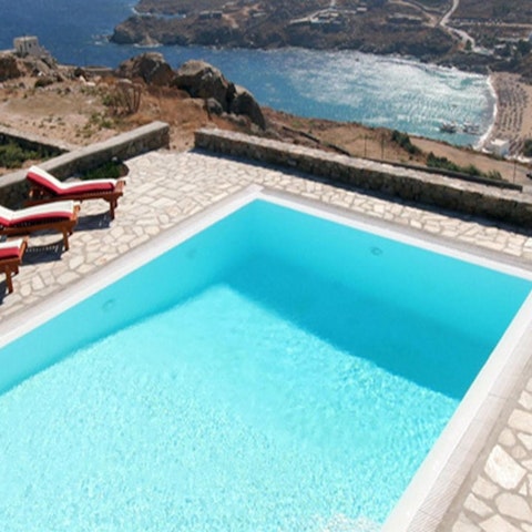 Slip into the swimming pool and enjoy a view suspended on the hillside
