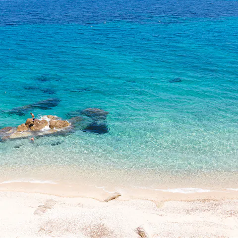 Head to the pristine shores of Super Paradise Beach, a five-minute walk away
