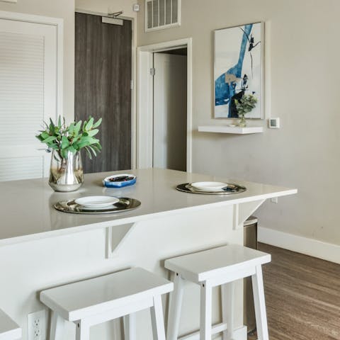 Start the day with breakfast at the kitchen island before heading out 