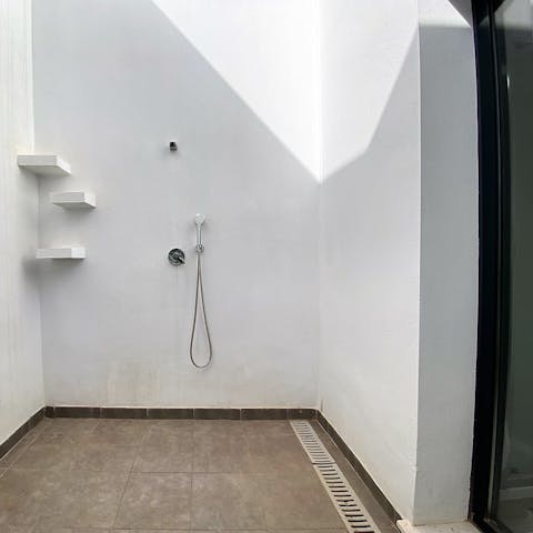 Freshen up in your outdoor shower, underneath the Spanish sun