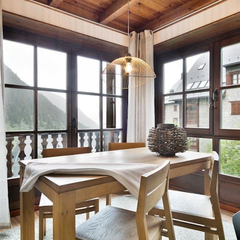 Tuck into breakfast with a view of the mountains