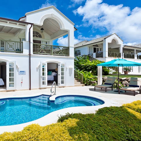 Sip cocktails on the sun lounger before slipping into the private pool