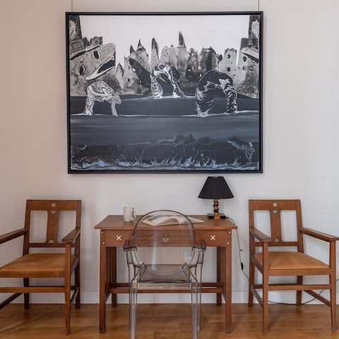 Catch up on work or plan your time in Paris at the desk in the library