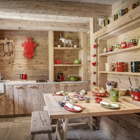 Nibble on fondue in the cosy kitchen