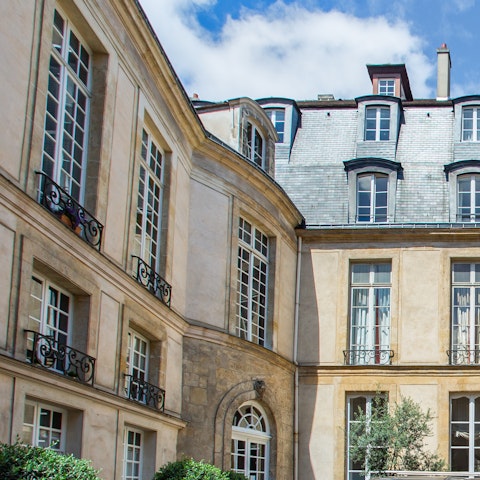 Admire the period archiecture of the apartment's exteriors