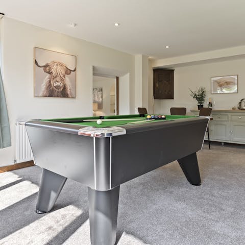 Challenge your guests to a pool tournament in the games room