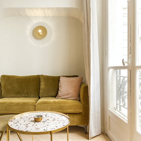 Kick back on the plush sofa with a glass of French wine