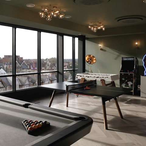 Unwind in the communal games room