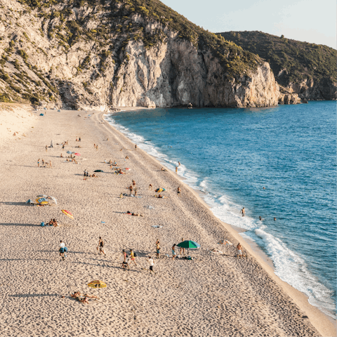 Walk just fifteen minutes to the sandy shores of Agios Ioannis beach