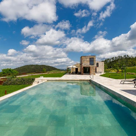 Relax by the private pool in the Tuscan sun