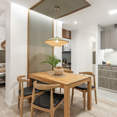 Share leisurely breakfasts around the sleek wooden table
