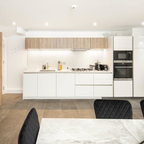 Cook family meals in the sleek kitchen