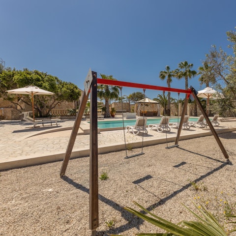 Float in the saltwater pool while the kids play