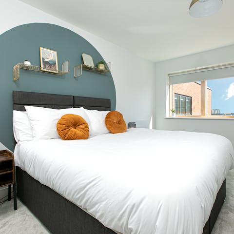 Wake up feeling calm and rested in the stylish bedroom