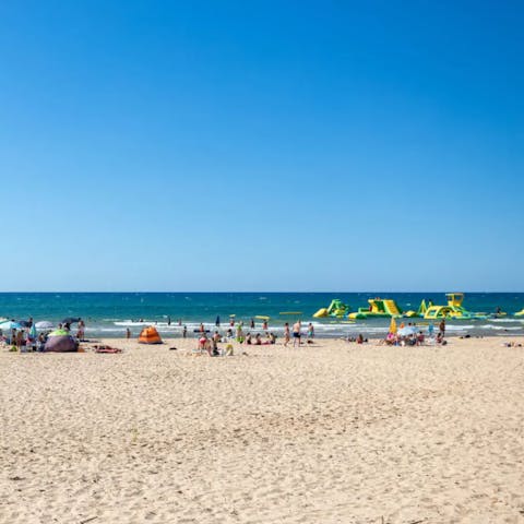 Swim and sunbathe at Balestrate Lido, a ten-minute walk away