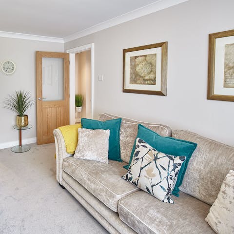 Unwind in this cosy living area with a hot cup of tea