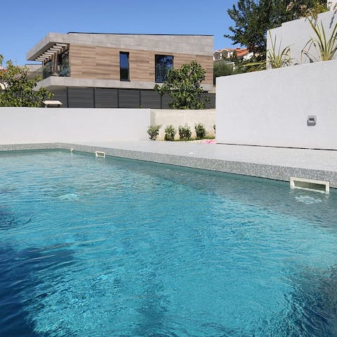 While away sunny hours in the shared pool