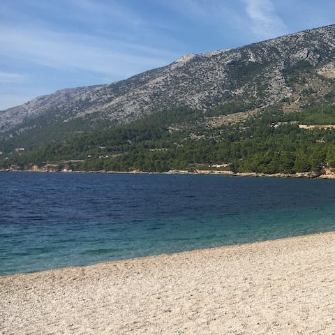 Spend afternoons at Plaža Baška, a ten-minute walk away