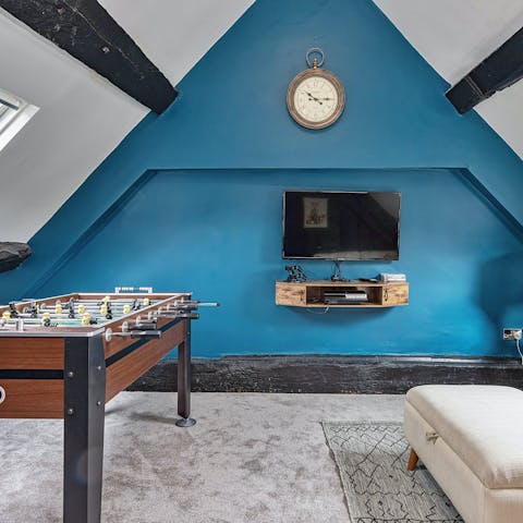 Play table football with fun pastimes dotted about this home