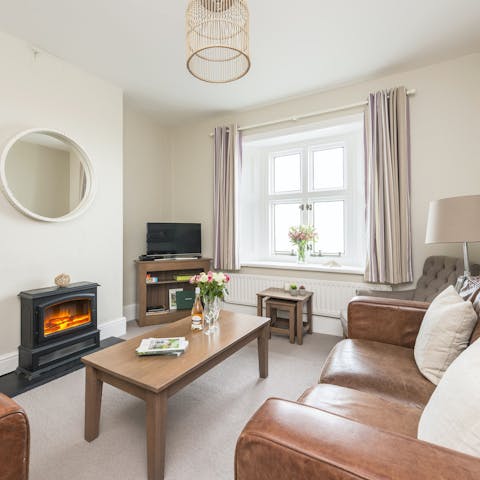 Curl up around the fire after a brisk coastal walk