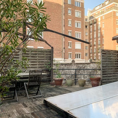 Head out to one of the three terraces to enjoy the Parisian sun