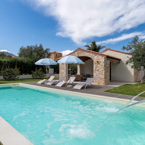 Enjoy total relaxation while lounging by the pool