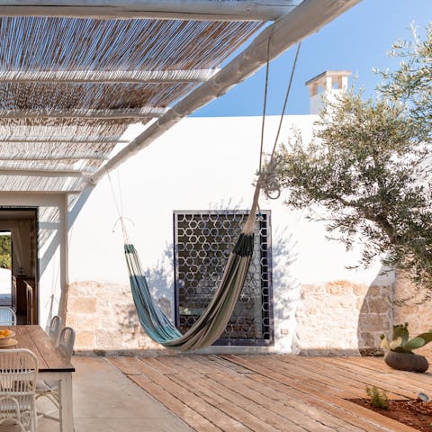 Lay in dappled sunlight on the terrace