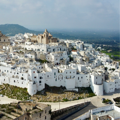 Wander through Ostuni and its white-washed houses