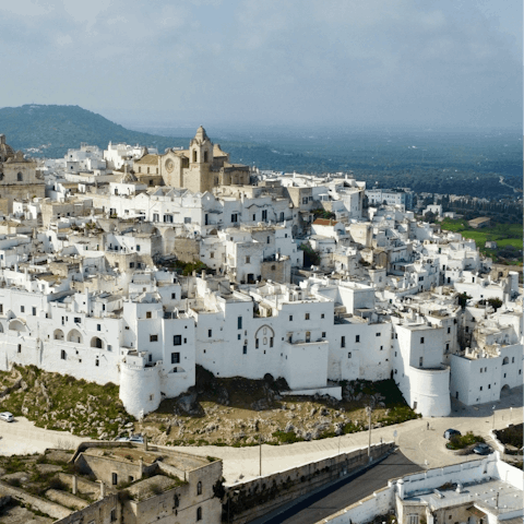 Wander through Ostuni and its white-washed houses