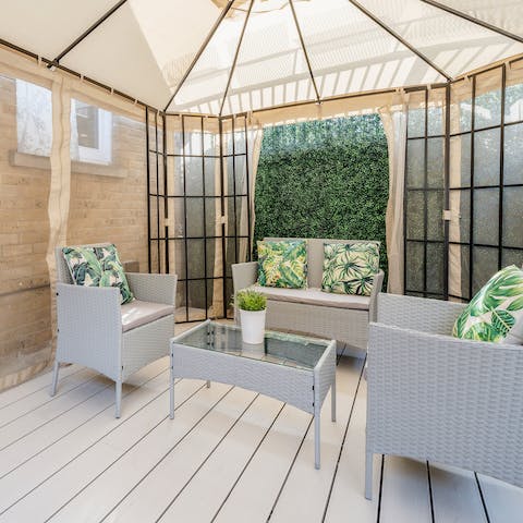 Enjoy drinks on the private terrace after a day of exploring