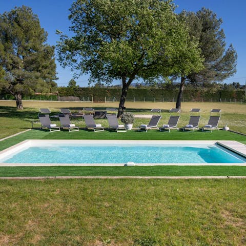 Enjoy the Provençal sunshine on a sun lounger next to the pool
