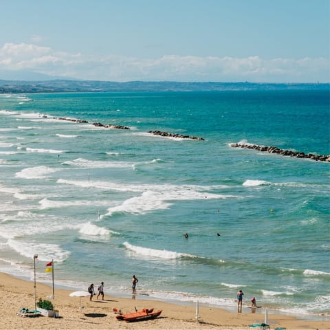 Spend a day at Rosa Marina Beach, just under 30 km from home