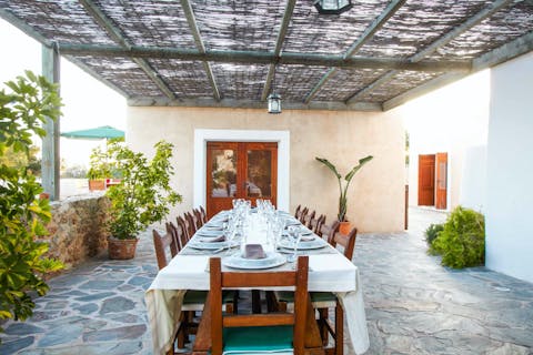 Dine alfresco with loved ones under the shade of the pergola